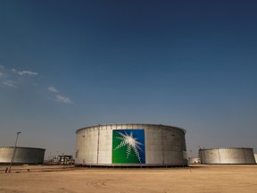 Branded oil tanks at a Saudi Aramco oil facility in Abqaiq, Saudi Arabia October 12, 2019.