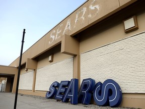 dismantled sign sits leaning outside a Sears department store one day after it closed as part of multiple store closures by Sears Holdings Corp in the United States in Nanuet, New York, U.S., January 7, 2019.