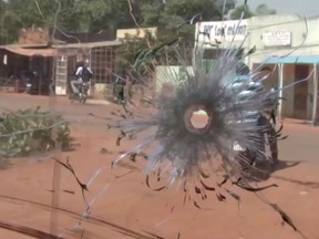 A bullet hole in a bus window is seen after it was attacked near Fada N'gourma, Burkina Faso, in this still image obtained from a video. At least 39 people were killed in the attack on the Semafo convoy last Wednesday.