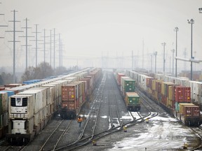 Trains sit on tracks at the Intermodal Terminals in Brampton, Ontario, on Tuesday. About 3,200 workers at Canadian National Railway Co. went on strike at midnight Tuesday.