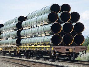 Pipes destined for the Trans Mountain pipeline are transported by rail through Kamloops, B.C.