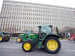 Farmers with tractors drive to the Papineau riding office of Prime Minister Justin Trudeau, as they protest the lack of propane due to the Canadian National Railway strike in Montreal, Quebec, November 25, 2019.