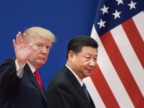 U.S. President Donald Trump, left, and China's President Xi Jinping during a meeting in Beijing in November, 2017. A meeting this year to sign a long-awaited trade deal could now be delayed until December.
