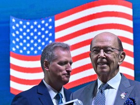 U.S. Secretary of Commerce Wilbur Ross, right, attends the Indo-Pacific Business Forum in Bangkok on Monday, on the sidelines of the 35th Association of Southeast Asian Nations (ASEAN) Summit.