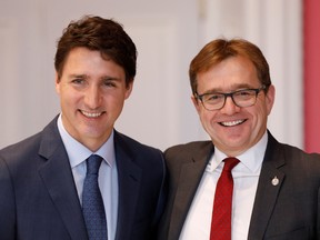 Jonathan Wilkinson poses with Prime Minister Justin Trudeau after being sworn-in as Minister of Environment and Climate Change during the presentation of Trudeau's new cabinet, at Rideau Hall in Ottawa, November 20, 2019.