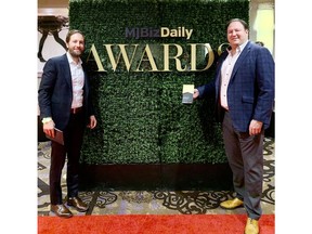 Cresco Labs CEO and Co-founder Charlie Bachtell and President and Co-founder Joe Caltabiano receive the U.S. Cannabis Industry Game Changer Award from MJBIZ