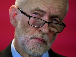 Britain's opposition Labour Party leader Jeremy Corbyn reacts as he speaks about Labour's environment policies in Southampton, Britain November 28, 2019.