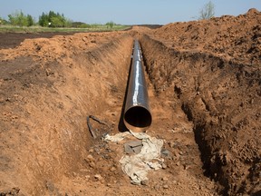 Newly laid oil pipe at a pipeline construction site in Russia.