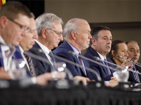 ason Kenney, Alberta's premier, third left, speaks during a news conference following the Canada's Premiers meeting in Toronto, Ontario, Canada, on Monday, Dec. 2, 2019.