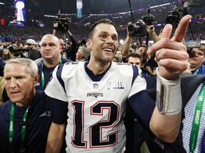 Tom Brady #12 of the New England Patriots celebrates after the Patriots defeat the Los Angeles Rams 13-3 during Super Bowl LIII at Mercedes-Benz Stadium on Feb. 3, 2019 in Atlanta, Georgia.