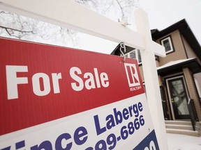 Existing home sales fell 0.9 per cent from November, the Canadian Real Estate Association reported Wednesday, reflecting a 1.8 per cent drop in new listings.