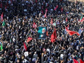 Iranian mourners gather during the final stage of funeral processions for slain top general Qasem Soleimani, in his hometown Kerman on January 7, 2020.