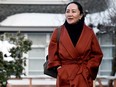 Huawei Chief Financial Officer Meng Wanzhou leaves her home to attend a case management conference in advance of her extradition hearing at B.C. Supreme Court in Vancouver on Jan. 17, 2020.