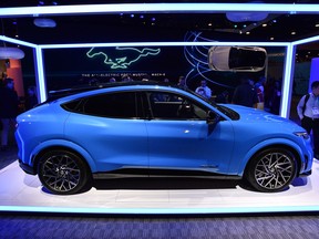 Ford's Mustang Mach E GT, an all-electric model scheduled for delivery at the end of the year, is displayed at the Ford booth during CES 2020 at the Las Vegas Convention Center on January 7, 2020 in Las Vegas, Nevada.