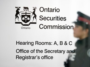 A Toronto Police Services officer at the Ontario Securities Commission.