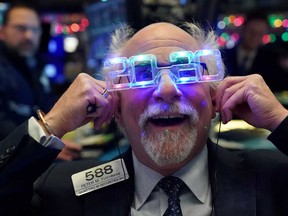 Trader Peter Tuchman wears 2020 glasses to celebrate the New Year at the New York Stock Exchange.