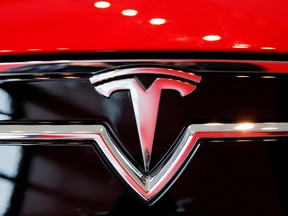 Tesla is set to report quarterly earnings next week.