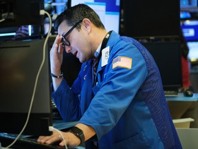 A trader on the floor of the New York Stock Exchange on Jan. 8, 2020.