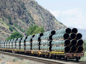 Pipes destined for the Trans Mountain pipeline are transported by rail through Kamloops, B.C.