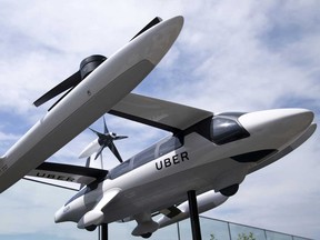 Uber Technologies Inc.'s eCRM-003, an electric vertical take-off and landing jet. Uber wants to offer short-haul flights at low altitudes between sky ports which will be built on rooftops, vacant parking lots, stadiums or highway interchanges.