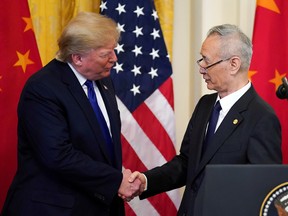 U.S. President Donald Trump with Chinese Vice Premier Liu He during a signing ceremony for Phase 1 of the U.S.-China trade agreement in the White House, Jan. 15, 2020.