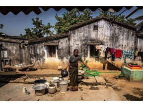 Mrs. Gurujalli Tejavathi outside her home in the Bhadradri District in India. Mrs. Tejavathi receives free eye care for a previously transplanted cornea from the Tej Kohli Foundation.