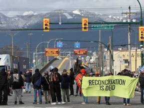 Supporters of the indigenous Wet'suwet'en Nation's hereditary chiefs block access to the Port of Vancouver as part of protests against the Coastal GasLink pipeline, in Vancouver, British Columbia, Canada February 24, 2020.
