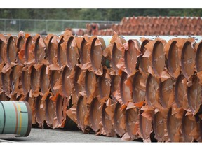 Pipeline pipes are seen at a Trans Mountain facility near Hope, B.C., on August 22, 2019. Canada's budget watchdog is projecting economic growth during the final quarter of 2019 will be "significantly weaker" than predicted in his fall report. In its latest report on near-term growth, the Parliamentary Budget Office says real GDP growth in the final three month period of last year will likely come in at near stagnant levels, at an annual rate of 0.3 per cent.