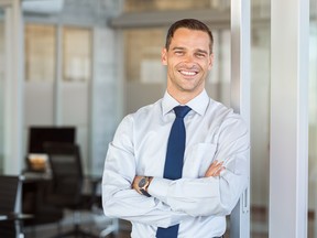 Smiling businessman at office