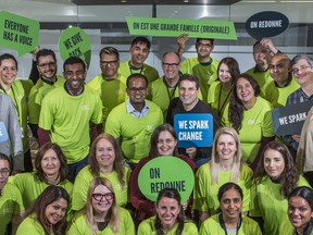 Green Shield Canada president and CEO, Zahid Salman, third row on the left, and Mila Lucio, executive vice-president, human resources & social impact, third row on the right, with employees at the offices of Green Shield Canada.