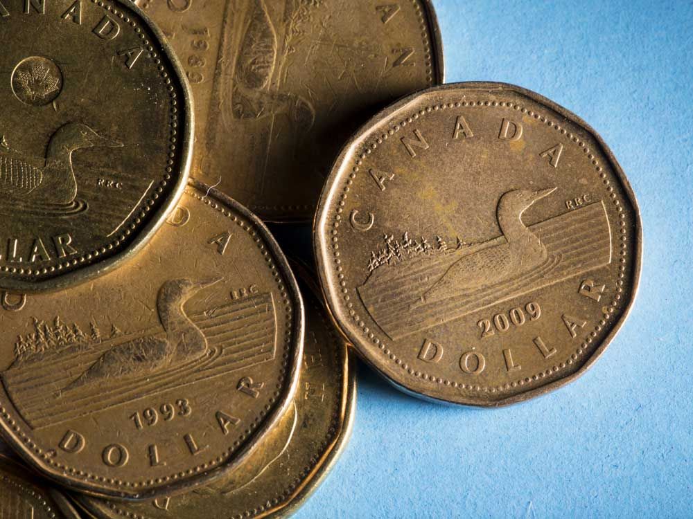 Faltering loonie propped up by gold, but rally at risk if Bank of
Canada makes 'insurance' cut next week