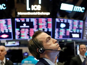 A trader works on the floor of the New York Stock Exchange shortly before the closing bell as the market takes a significant dip in New York, U.S., February 25, 2020.