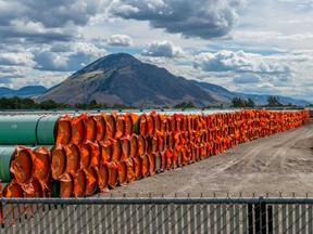 Steel pipe to be used in the oil pipeline construction of the Canadian government’s Trans Mountain Expansion Project lies at a stockpile site in Kamloops, British Columbia.