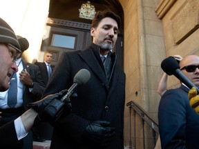 Prime Minister Justin Trudeau leaves the Office of the Prime Minister and Privy Council building following a meeting of the Federal governments Incident Response Group in Ottawa, Monday, February 17.