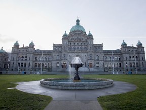A fountain stands in front of the British Columbia Parliament Buildings in Victoria, British Columbia.