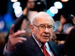 Warren Buffett's Berkshire Hathaway holds a record US$128 billion in cash and U.S. Treasury bills.