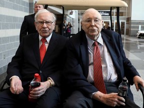 Berkshire Hathaway Chairman Warren Buffett, left, and Vice Chairman Charlie Munger at the annual Berkshire shareholder shopping day in Omaha, Nebraska in May 2019.