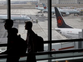 An Air Canada Boeing 737 MAX 8 jet tail is seen on the tarmac at Toronto Pearson International Airport on March 13, 2019 in Toronto.