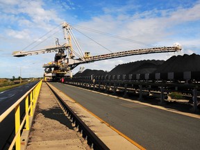 A coal spreader distributes coal at Dalrymple Bay Coal Terminal in Queensland, Australia.