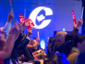 Delegates vote on party constitution items at the Conservative Party of Canada national policy convention in Halifax on Friday, Aug. 24, 2018.