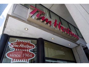 A Tim Hortons coffee shop is shown in downtown Toronto on Wednesday, June 29, 2016. Tim Hortons says it will stop accepting reusable cups brought in by customers amid concerns about the novel coronavirus outbreak.