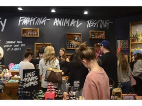 Holiday shoppers browse at Lush, a cosmetics store at Cherry Creek Shopping Center in Denver, Colo. on November 24, 2017. Cosmetics company LUSH has launched a campaign calling on people to pressure Parliament to back out of an agreement with the U.S. that governs refugee claims. It's part of a broader effort by the U.K.-based company to draw attention to the impacts of major changes to U.S. immigration policy.