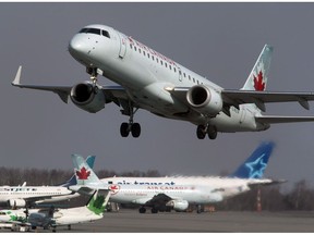 An Air Canada jet takes off from Halifax Stanfield International Airport in Enfield, N.S. on Thursday, March 8, 2012. A union official says Air Canada is laying off more than 5,000 flight attendants as the country's largest airline cuts routes and parks planes due to COVID-19.