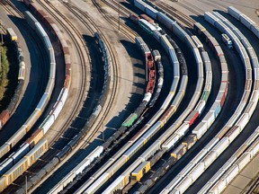 Freight trains and oil tankers sit in a rail yard in this aerial photograph taken above Toronto.