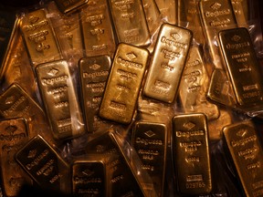 The gold market is caught between demand for a haven and a rush to raise cash and cover losses in other markets.