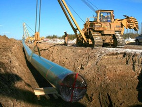 Inter Pipeline, which transports crude from Canada's oilsands region, said the cut to its monthly payout would save $525 million per year.