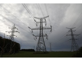 Hydro One electricity transmission lines are seen south of Chesley, Ont., on Sunday, Sept. 29, 2019. It's as if the COVID-19 epidemic had tripped a circuit breaker, shutting off all power to a city the size of Ottawa.