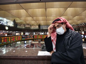 A Kuwaiti stock trader on March 1.