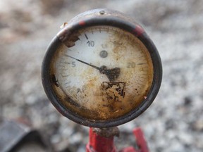 A pressure gauge sits attached to crude oil pipework in an oilfield near Almetyevsk, Tatarstan, Russia. WTI fell to $25 a barrel today.