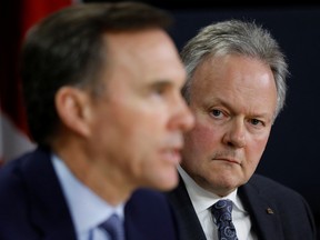 Bank of Canada Governor Stephen Poloz and Canada's Minister of Finance Bill Morneau attend a news conference in Ottawa, Ontario, Canada March 13, 2020.